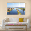 Traditional windmills at Kinderdijk in the Netherlands Multi panel canvas wall art