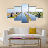 Traditional windmills at Kinderdijk in the Netherlands Multi panel canvas wall art