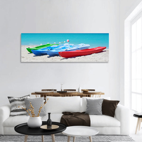 Group of kayaks ready to be rented in a beach Panoramic Canvas Wall Art
