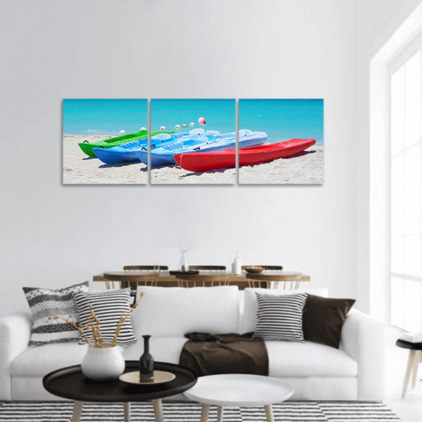 Group of kayaks ready to be rented in a beach Panoramic Canvas Wall Art