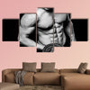 Young strong athlete on dark background isolated Multi panel canvas wall art