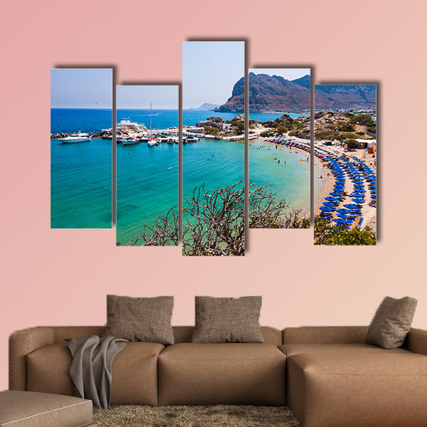 Kolymbia beach with the rocky coast in Greece multi panel canvas wall art