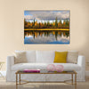 Scenic view of reflection of trees on lake, Sweden multi panel canvas wall art