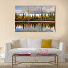 Scenic view of reflection of trees on lake, Sweden multi panel canvas wall art