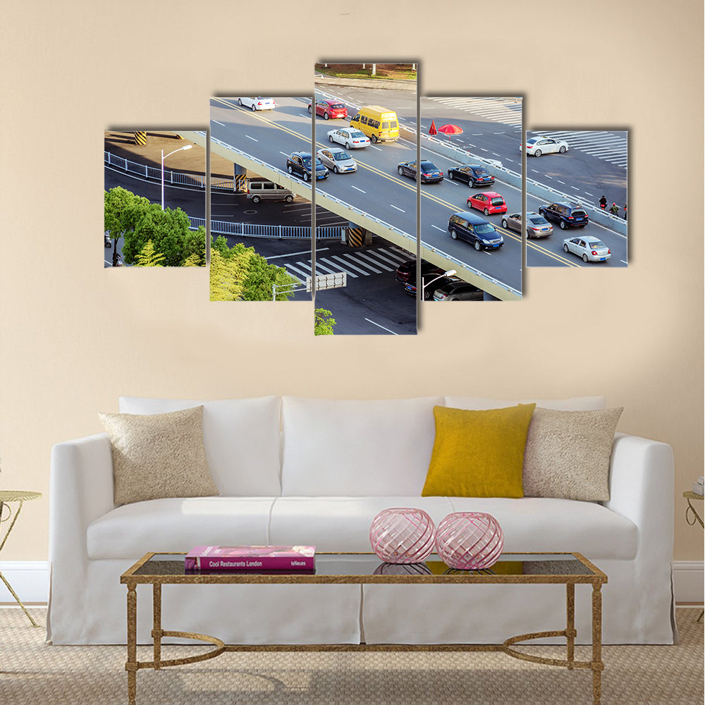 Modern transportation hub, full of Bridge Approach car. multi panel canvas wall art