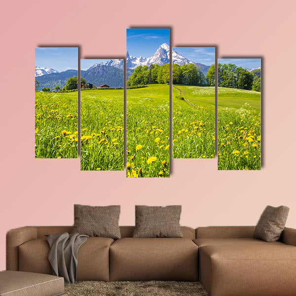 Idyllic landscape in the Alps with fresh green meadows wall art