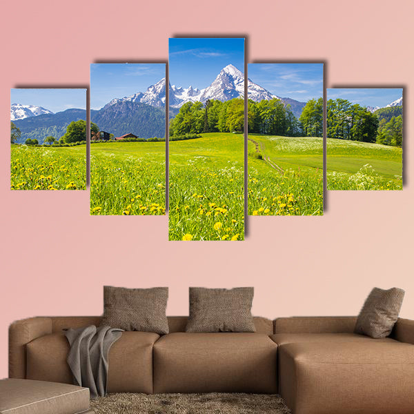 Idyllic landscape in the Alps with fresh green meadows wall art