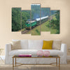 Passenger train passing through polish countryside Multi panel canvas wall art