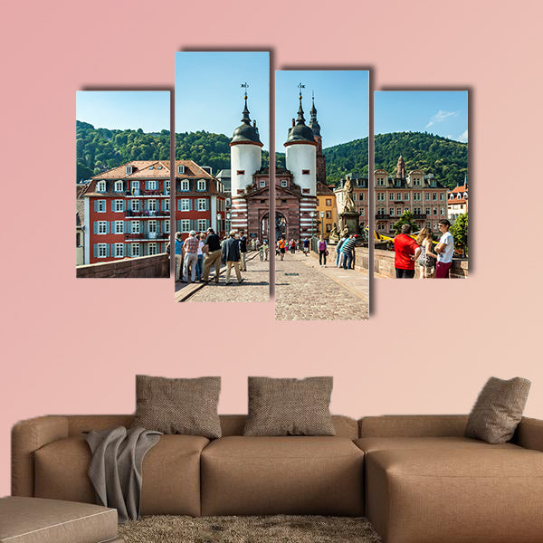 People visit old bridge and town gate in Heidelberg, Germany wall art