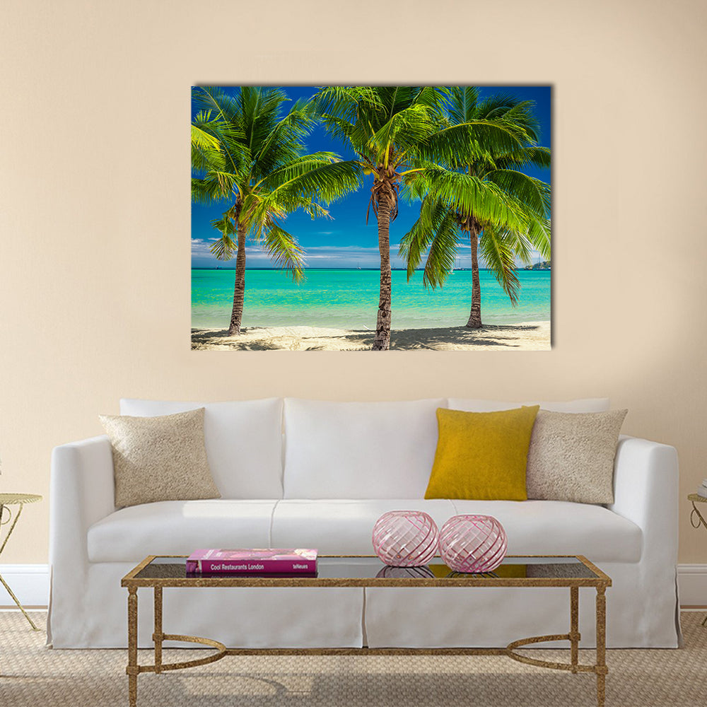 Three palm trees over blue lagoon in Fiji Islands multi panel canvas wall art
