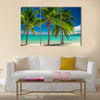 Three palm trees over blue lagoon in Fiji Islands multi panel canvas wall art