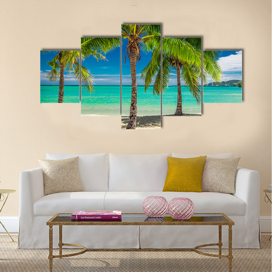 Three palm trees over blue lagoon in Fiji Islands multi panel canvas wall art