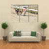 Sprinting Dynamic Greyhounds On The Race Course Multi Panel Canvas Wall Art