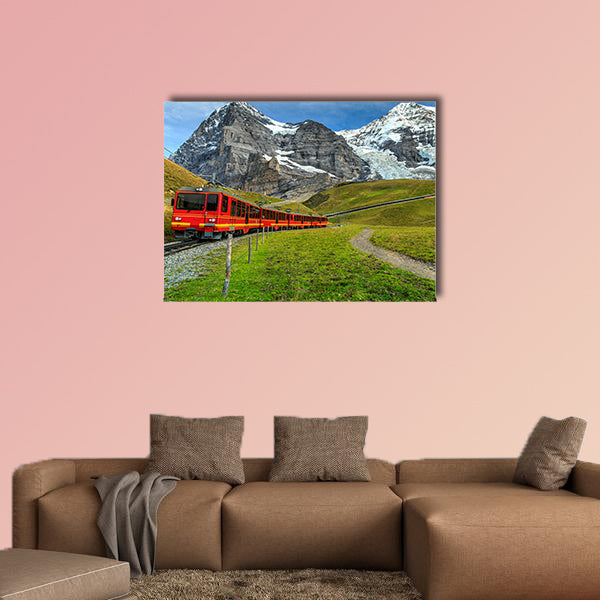 Famous electric red tourist train coming down in Kleine canvas wall art