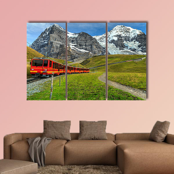 Famous electric red tourist train coming down in Kleine canvas wall art
