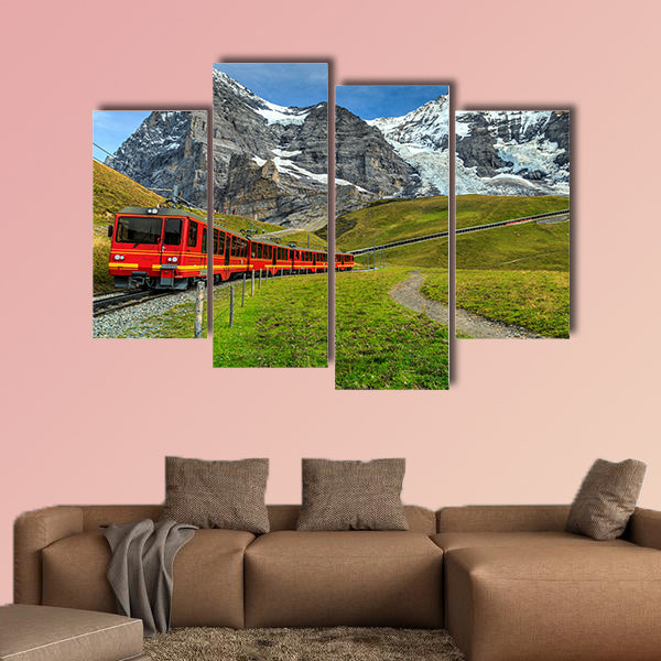 Famous electric red tourist train coming down in Kleine canvas wall art