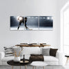 Hockey player in lights panoramic canvas wall art