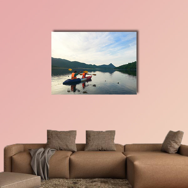 Man and woman are kayaking Multi panel canvas wall art