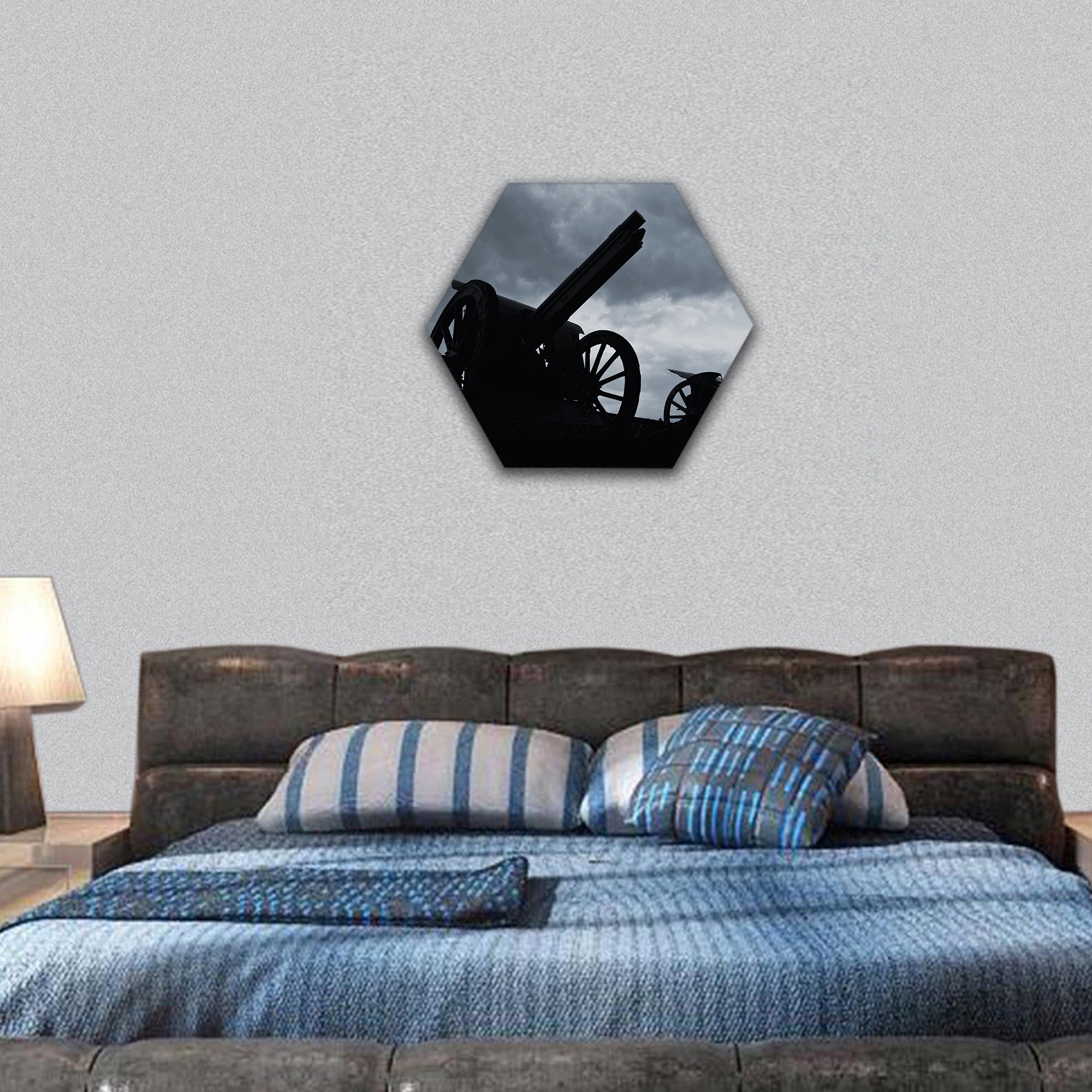 Cannon silhouettes in the late evening hexagonal canvas wall art