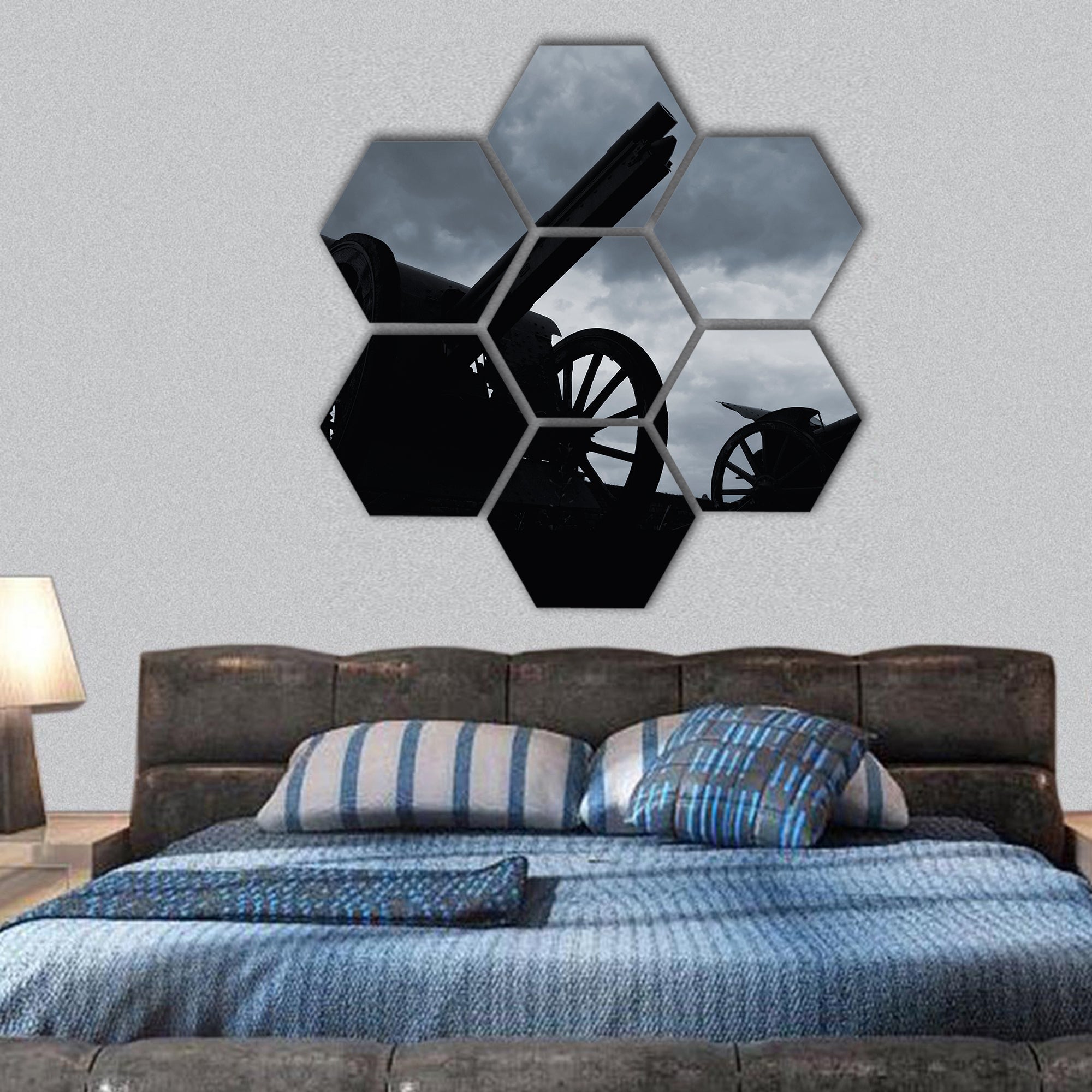 Cannon silhouettes in the late evening hexagonal canvas wall art