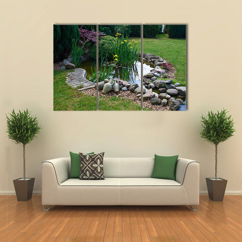 A Classical Garden Having The Background Of The Grass Gardening And Fish Pond, Multi Panel Canvas Wall Art