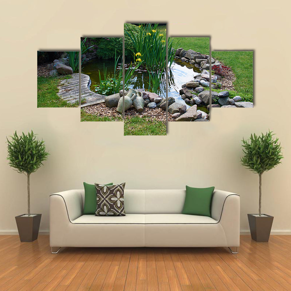 A Classical Garden Having The Background Of The Grass Gardening And Fish Pond, Multi Panel Canvas Wall Art