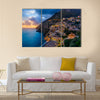 Sunset over Positano near Sorrento at Amalfi Coast in Italy Multi Panel Canvas Wall Art