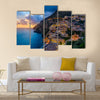 Sunset over Positano near Sorrento at Amalfi Coast in Italy Multi Panel Canvas Wall Art