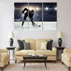 Hockey player in blue uniform Multi panel canvas wall art