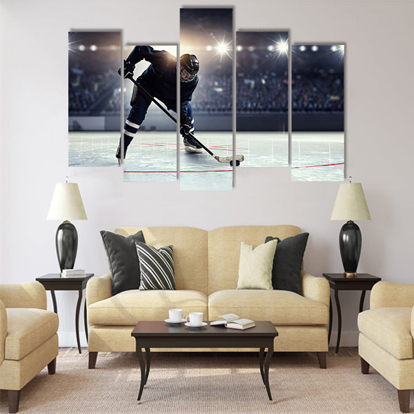 Hockey player in blue uniform Multi panel canvas wall art