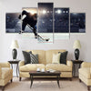 Hockey player in blue uniform Multi panel canvas wall art