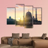 Putra mosque during sunrise with reflection, Malaysia multi panel canvas wall art