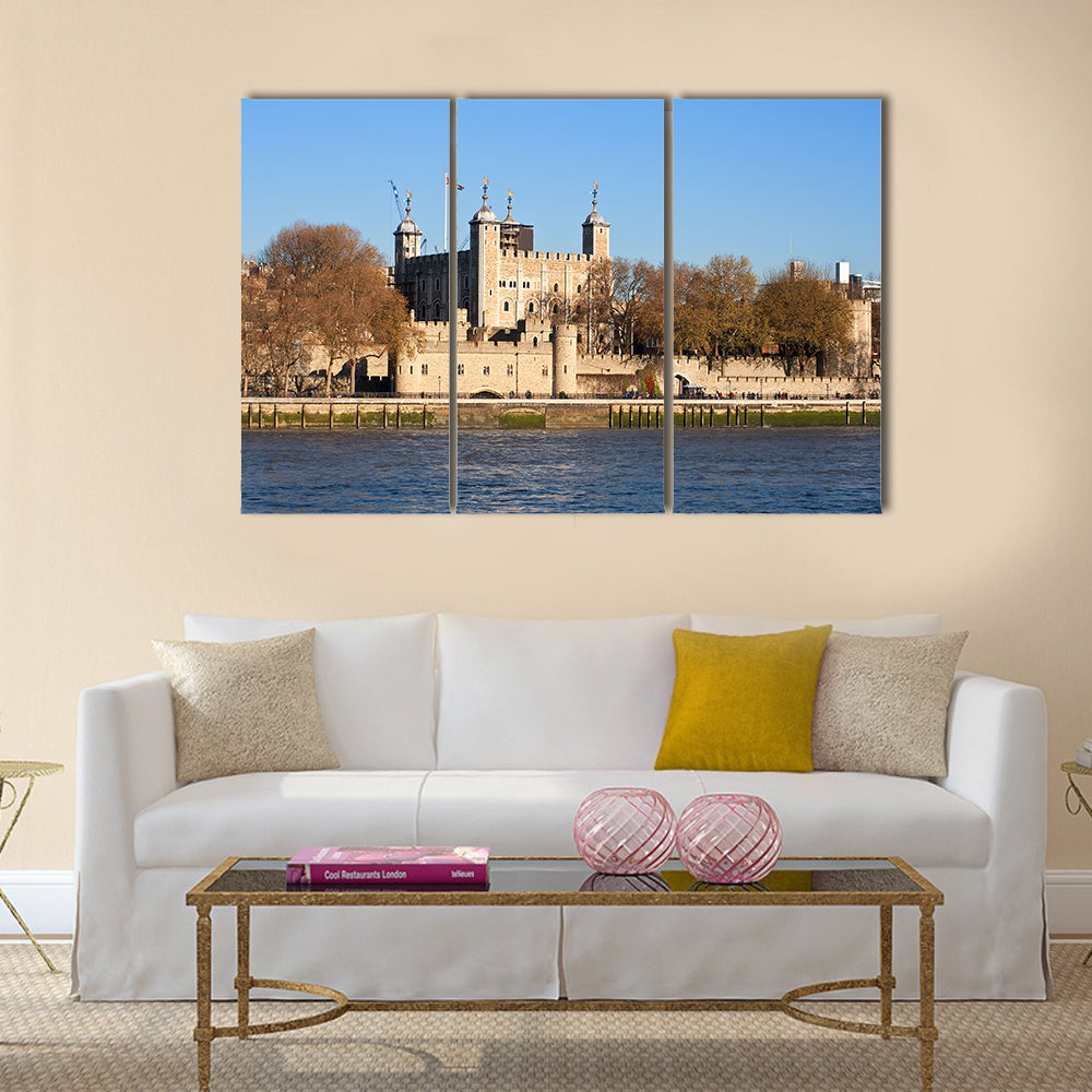The Tower of London seen across the river Thames in a clear day Multi Panel Canvas Wall Art