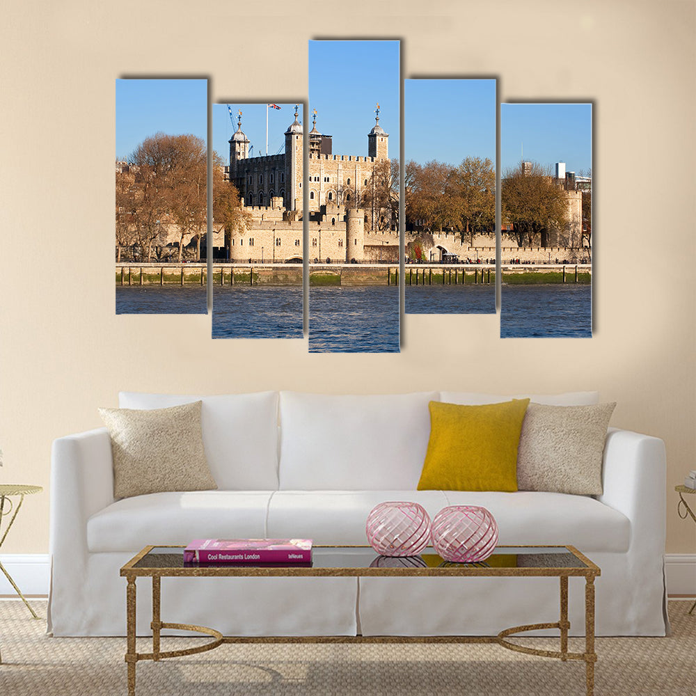 The Tower of London seen across the river Thames in a clear day Multi Panel Canvas Wall Art