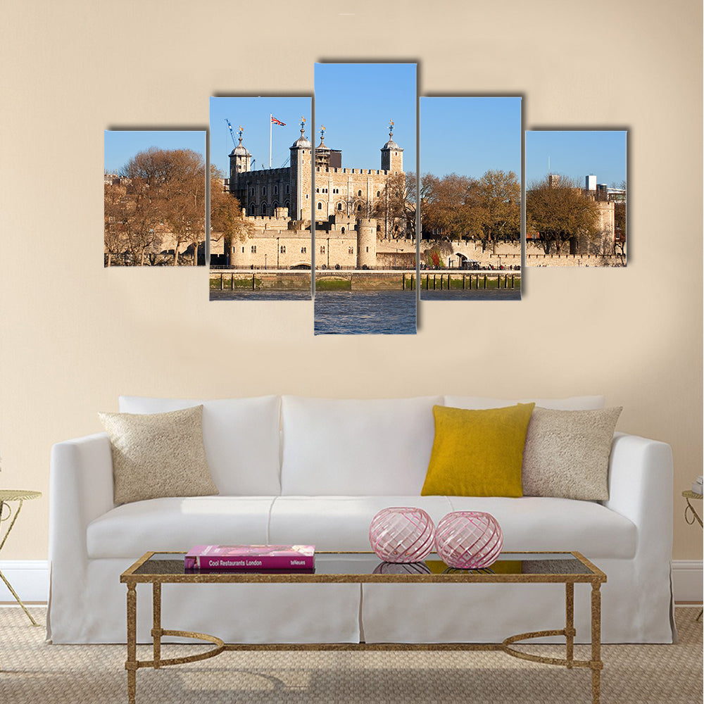 The Tower of London seen across the river Thames in a clear day Multi Panel Canvas Wall Art
