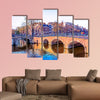 Traditional Dutch houses and old bridges on the canals in Amsterdam wall art