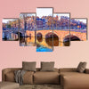 Traditional Dutch houses and old bridges on the canals in Amsterdam wall art