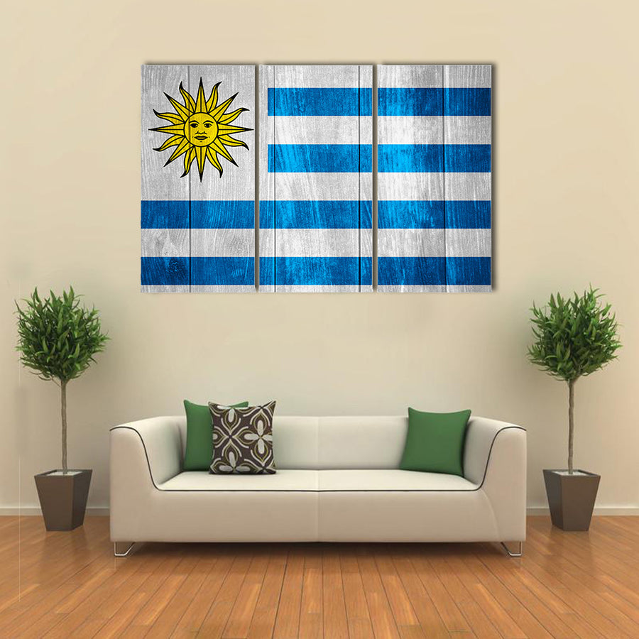 Flag of Uruguay or Uruguayan banner on wooden background Multi panel canvas wall art