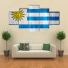 Flag of Uruguay or Uruguayan banner on wooden background Multi panel canvas wall art