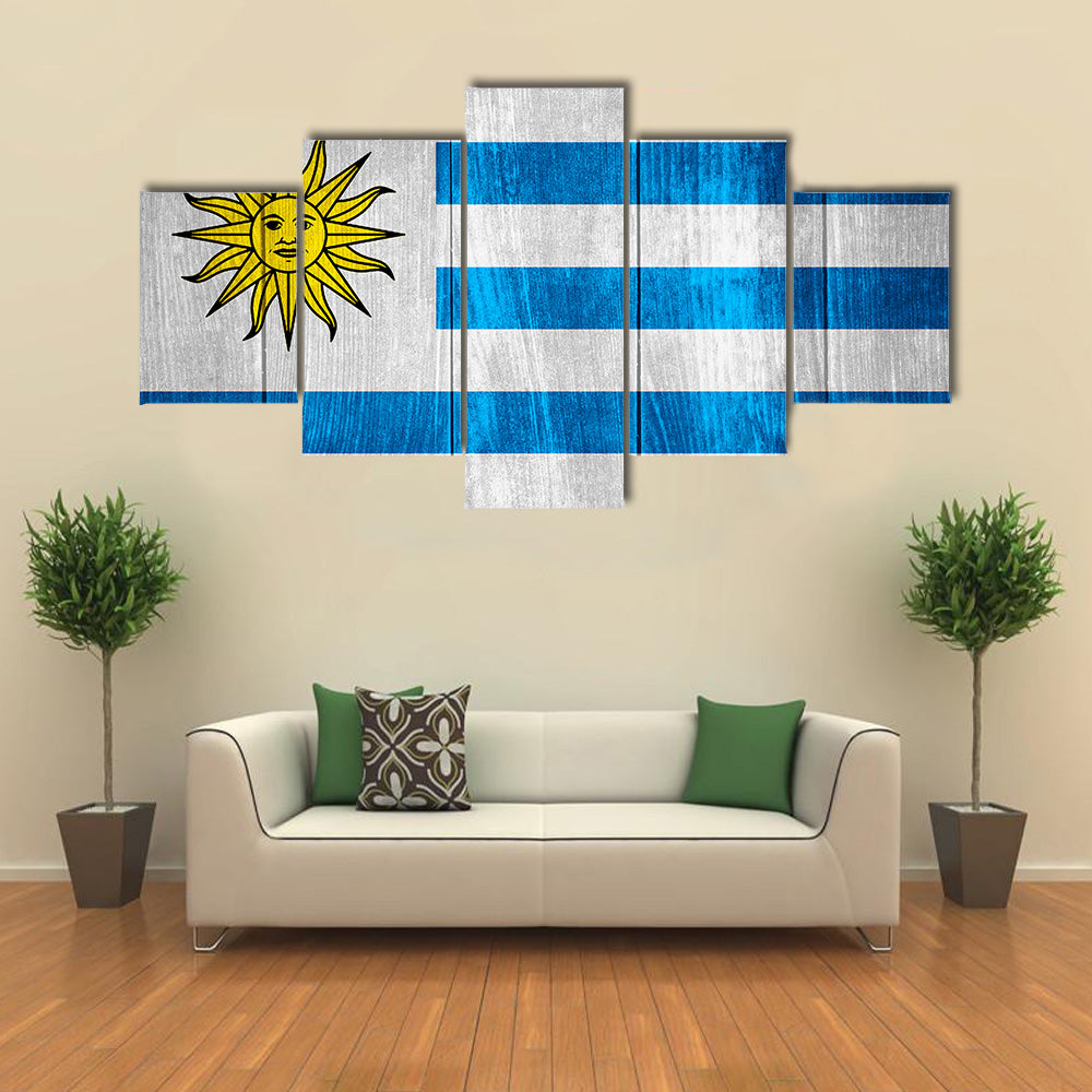 Flag of Uruguay or Uruguayan banner on wooden background Multi panel canvas wall art