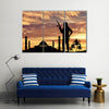 Armed terrorists near the mosque at sunset Multi Panel Canvas Wall Art