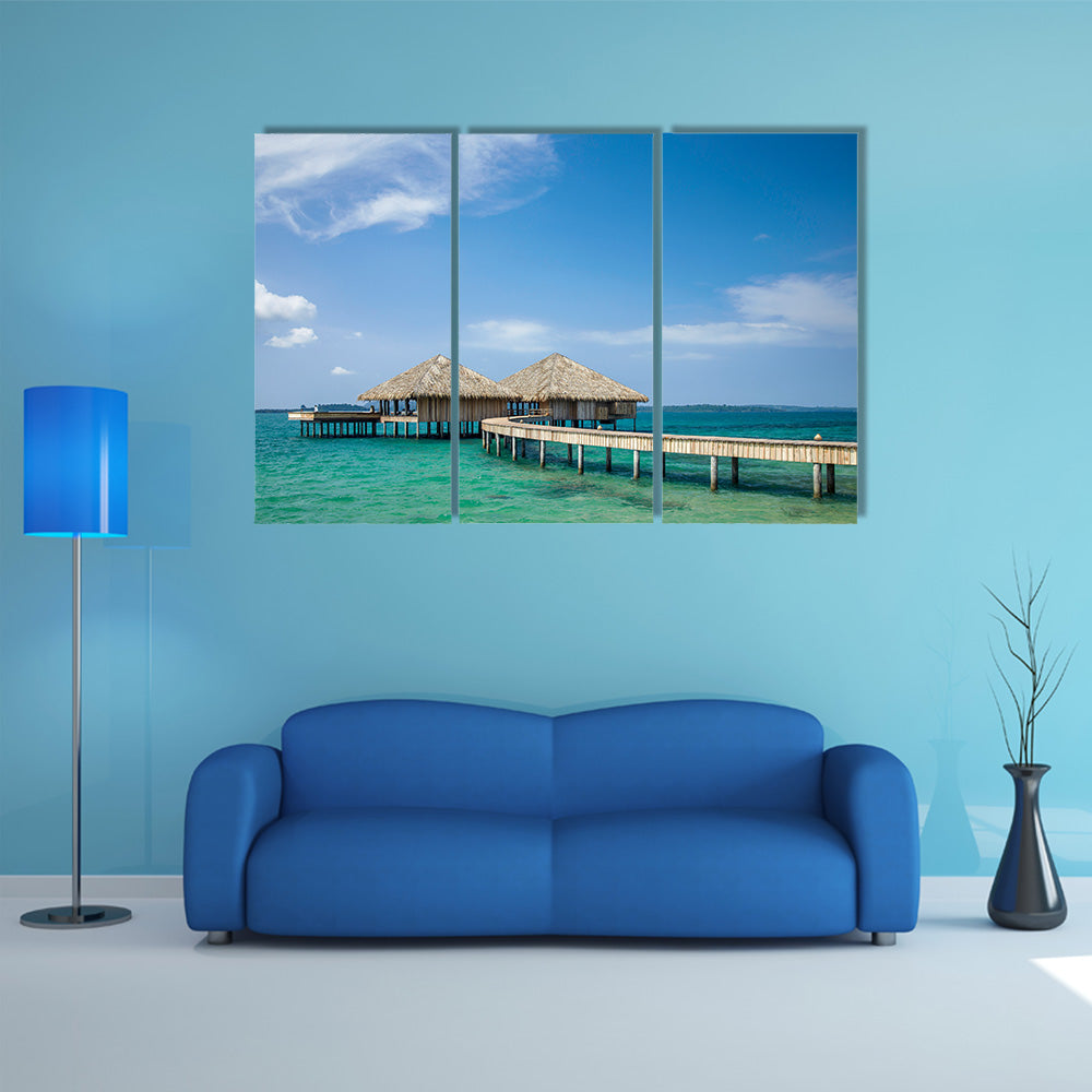 The Water Bungalows on the tropical lagoon in Maldives Multi Panel Canvas Wall Art
