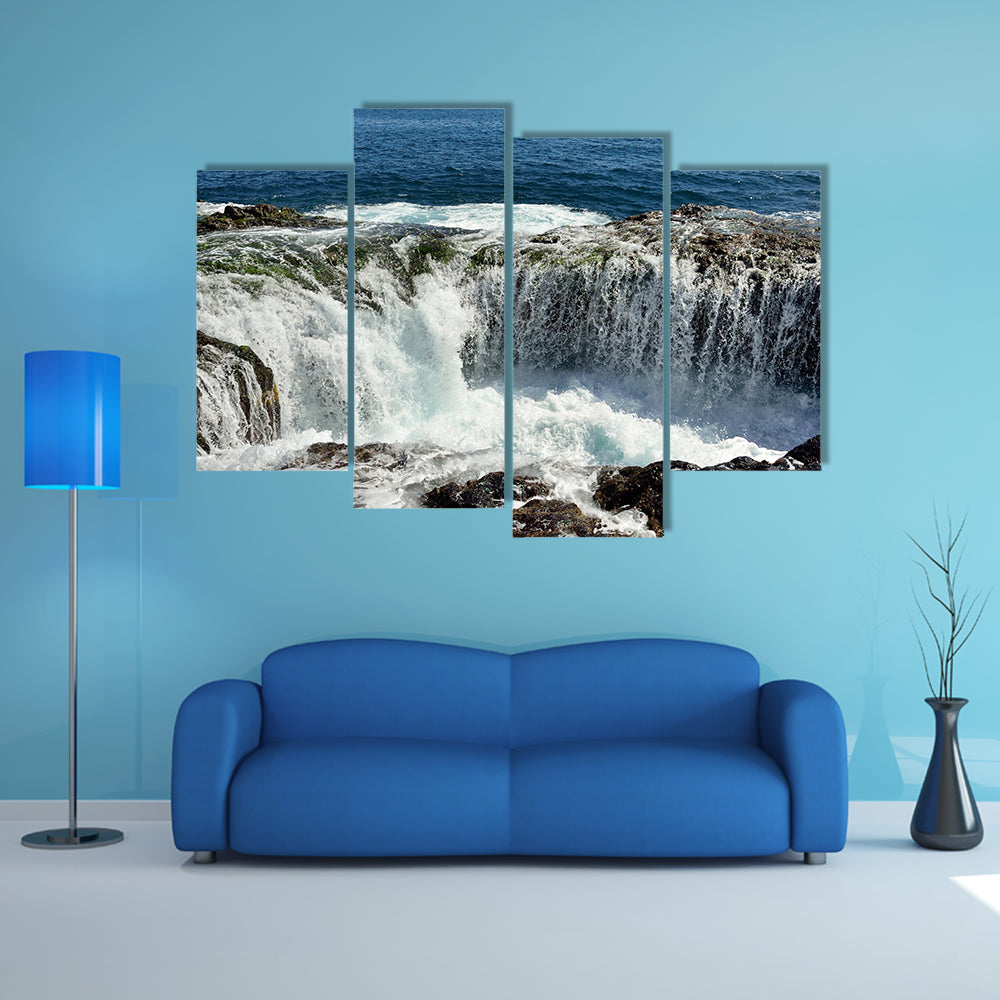 Spontaneous waterfall in natural pool at high tide, coast of Telde multi panel canvas wall art