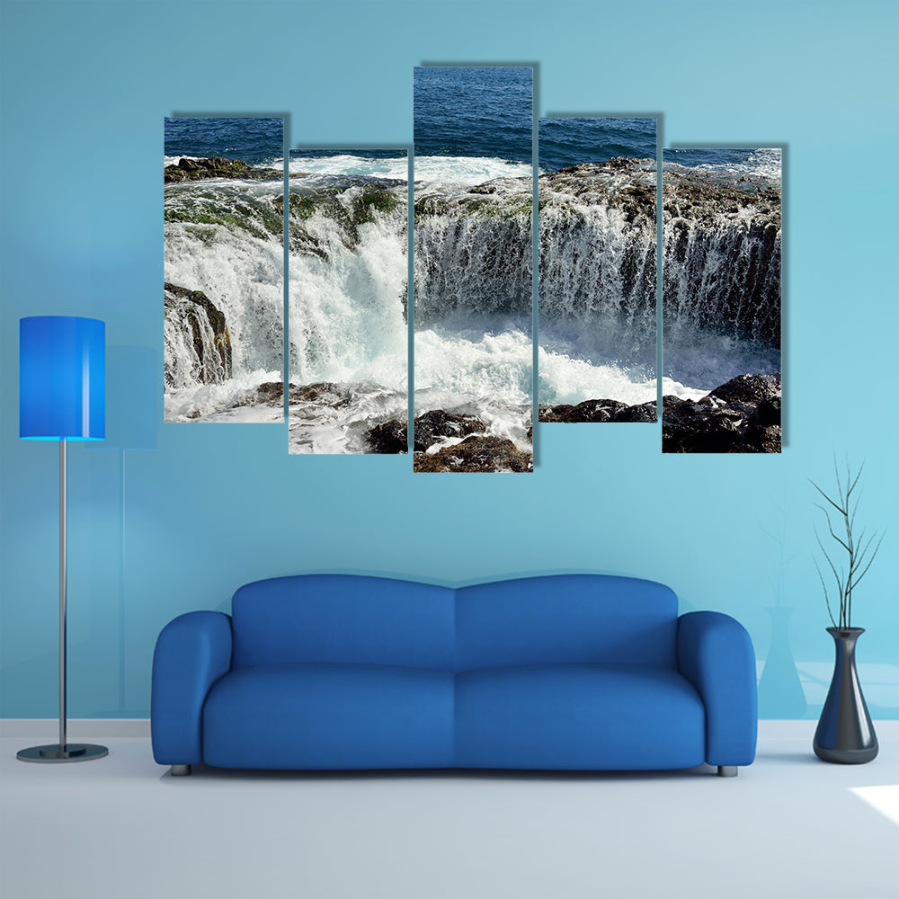 Spontaneous waterfall in natural pool at high tide, coast of Telde multi panel canvas wall art