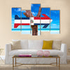 Dominican Republic flag sign with arrow on beach Multi Panel Canvas Wall Art