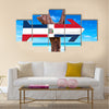 Dominican Republic flag sign with arrow on beach Multi Panel Canvas Wall Art