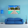 The Beach Bungalows On A Tropical Island Multi Panel Canvas Wall Art