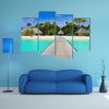 The Beach Bungalows On A Tropical Island Multi Panel Canvas Wall Art