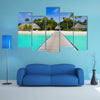 The Beach Bungalows On A Tropical Island Multi Panel Canvas Wall Art