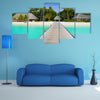 The Beach Bungalows On A Tropical Island Multi Panel Canvas Wall Art